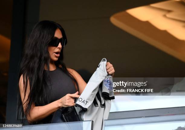 Media personality and socialite Kim Kardashian attends the French L1 football match between Paris Saint-Germain and Stade Rennais FC at The Parc des...