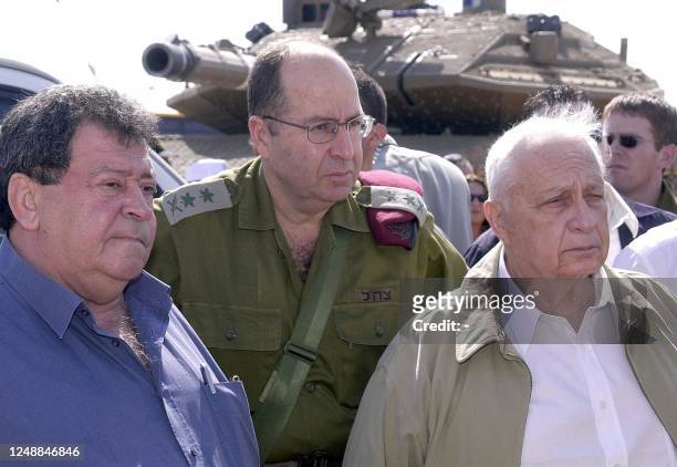 Israeli Premier Ariel Sharon , chief of staff General Moshe Yaalon and Defense Minister Benjamin Ben-Eliezer attend a special military training...