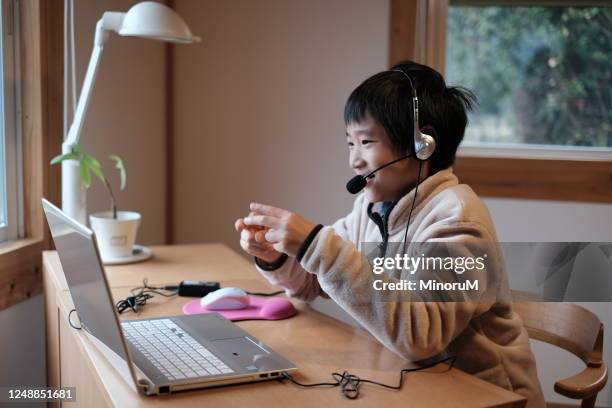 boy studying at home e-learning - e learning asian stock pictures, royalty-free photos & images