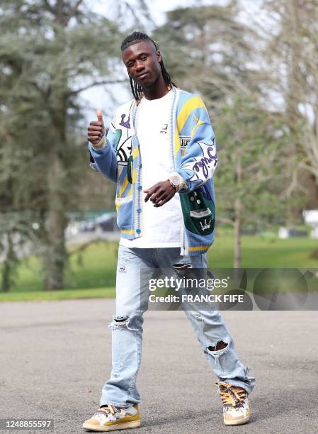 France's midfielder Eduardo Camavinga arrives in Clairefontaine-en-Yvelines on March 20, 2023 as part of the team's preparation for upcoming UEFA...