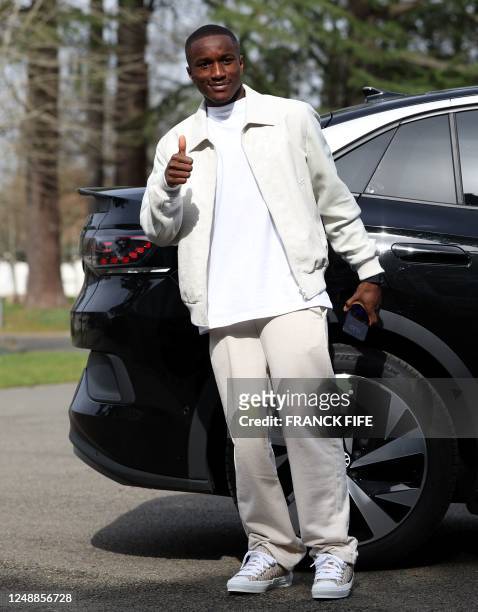 France's forward Moussa Diaby arrives in Clairefontaine-en-Yvelines on March 20, 2023 as part of the team's preparation for upcoming UEFA Euro 2024...