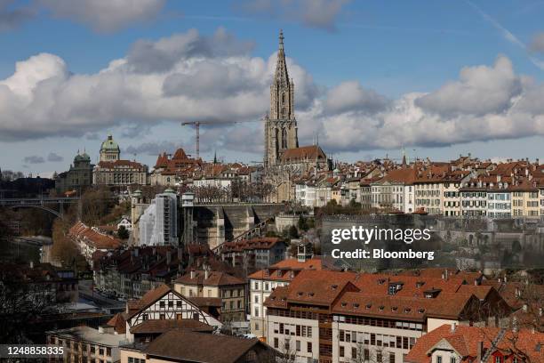 Residential and commercial properties surround the Bern Minster cathedral on the city skyline in Bern, Switzerland, on Monday, March 20, 2023....