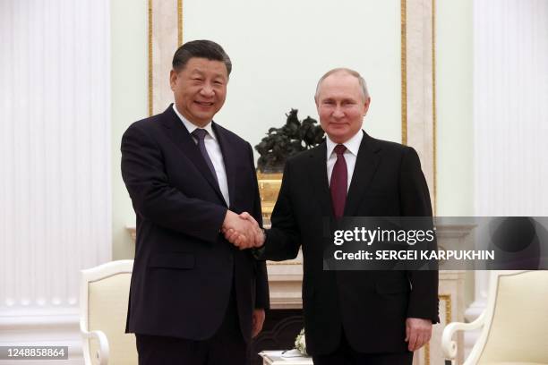 Russian President Vladimir Putin meets with China's President Xi Jinping at the Kremlin in Moscow on March 20, 2023.