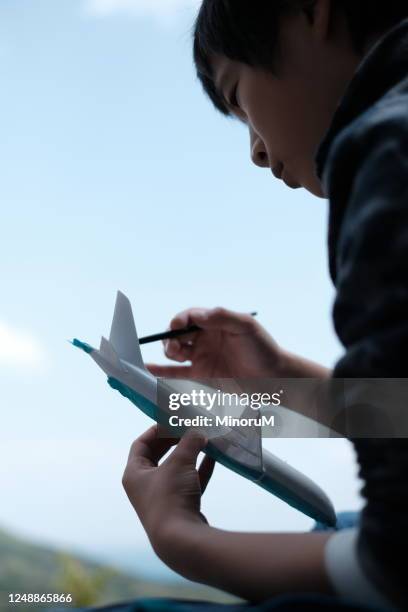 Boy Making Model Kit Model Plane Kit Photos and Premium High Res Pictures - Getty Images