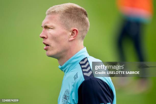 Denmark's Rasmus Nissen Kristensen takes part in a training session in Helsingoer, Denmark, on March 20 prior the upcoming UEFA Euro 2024 football...