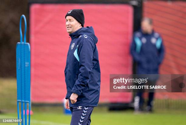 Denmark's National coach Kasper Hjulmand oversees a training session in Helsingoer, Denmark, on March 20 prior the upcoming UEFA Euro 2024 football...