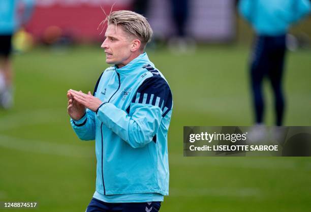 Denmark's Jens Stryger Larsen takes part in a training session in Helsingoer, Denmark, on March 20 prior the upcoming UEFA Euro 2024 football...