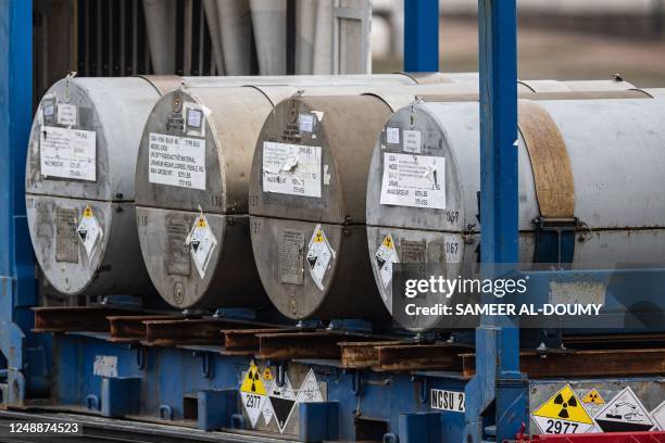 This photograph taken on March 20 shows cylinders of uranium from the Russian cargo ship the Baltiyskiy 202, unloaded at the port of Dunkirk,...
