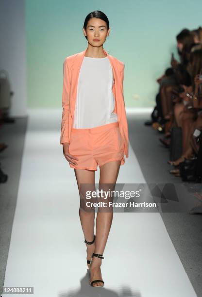 Model walks the runway at the Tibi Spring 2012 fashion show during Mercedes-Benz Fashion Week at The Stage at Lincoln Center on September 13, 2011 in...