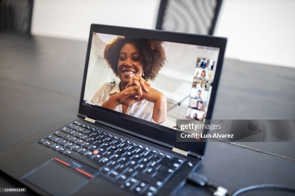 Business people brainstorming ideas during a virtual meeting
