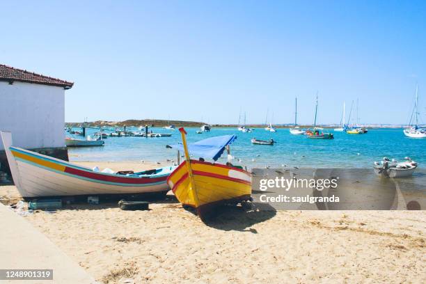 colorful fishing boats in algarve - alvor stock pictures, royalty-free photos & images