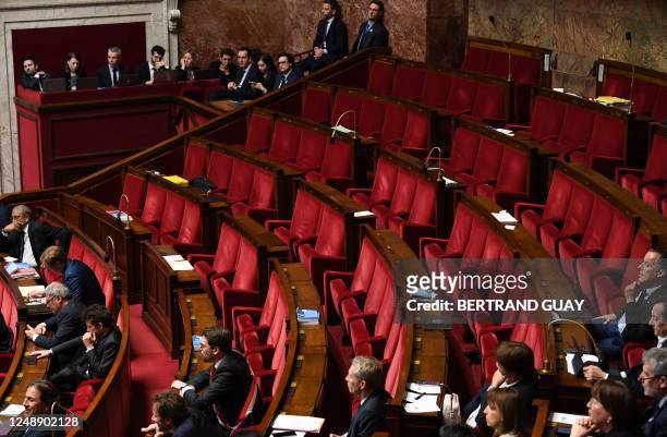 This photograph shows the empty seats of members of National Assembly parliamentary group La France Insoumise and left-wing coalition NUPES as...