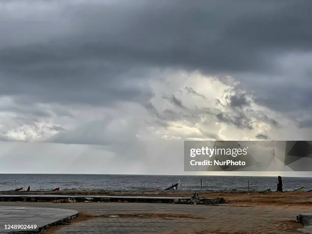 Rain clouds over Shangumugham Beach in Thiruvananthapuram , Kerala, India, on May 12, 2022.
