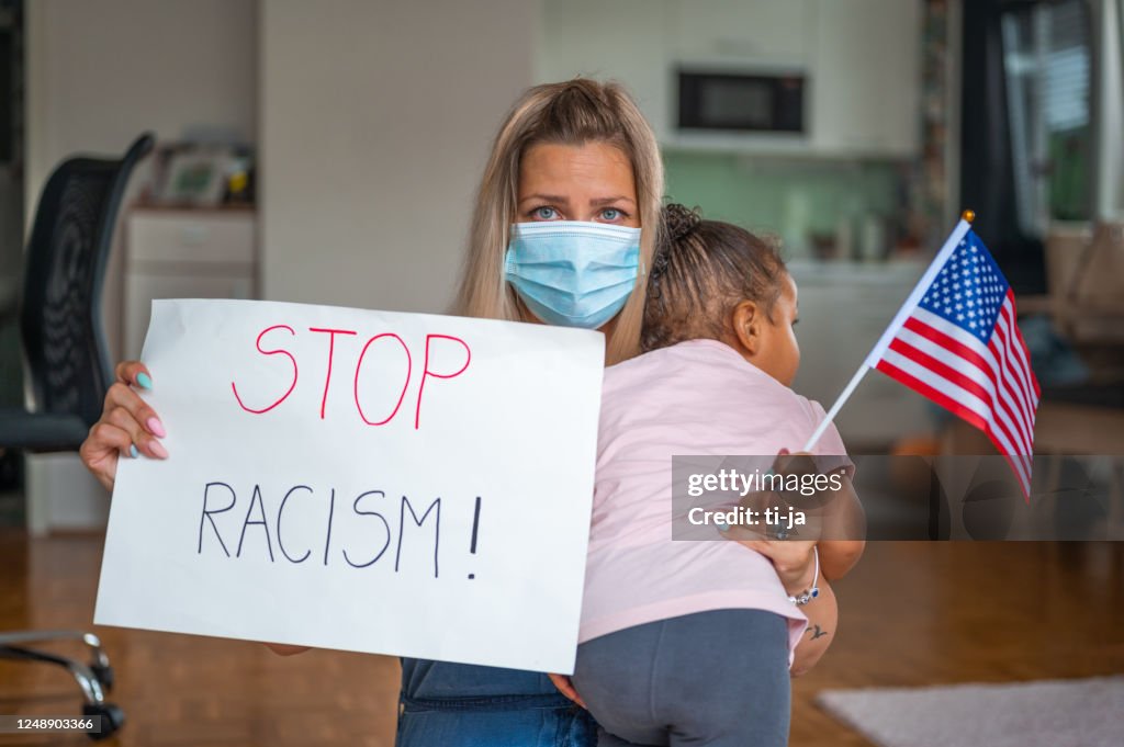 Anti Racism Mask Young Woman With Protective Face Mask Holding A Child And A Poster With ...