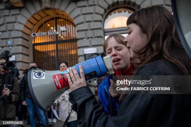 Member of Young Socialists Switzerland party stage a demonstration in front of the headquarters of Credit Suisse bank on March 20 following the...