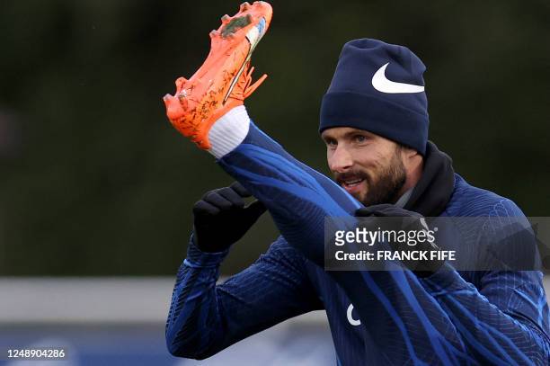 France's forward Olivier Giroud during a training session in Clairefontaine-en-Yvelines on March 20, 2023 as part of the team's preparation for...
