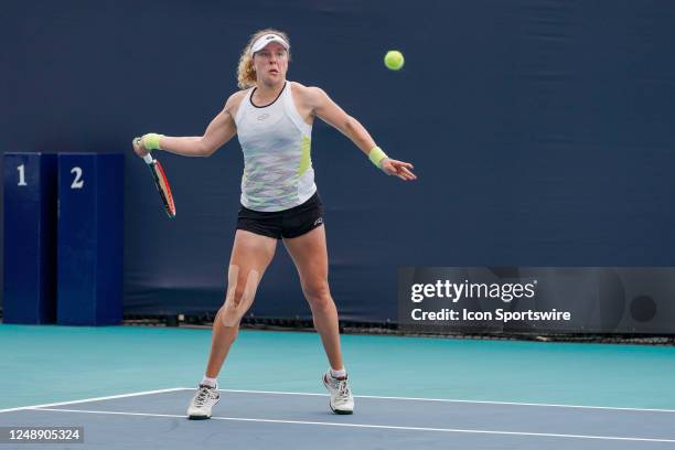 Anna-Lena Friedsam hits a shot during the qualifying round of the Miami Open on March 19, 2023 at Hard Rock Stadium in Miami Gardens, FL.