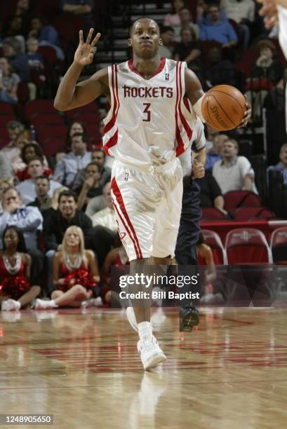 Steve Francis of the Houston Rockets calls a play as he brings the ball up court against the Miami Heat as the Rockets defeated the Heat 90-70 on...