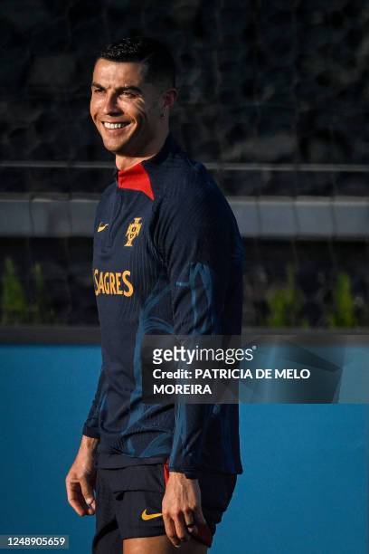 Portugals forward Cristiano Ronaldo attends a training session at Cidade do Futebol training camp in Oeiras, outskirts of Lisbon, on March 20 ahead...