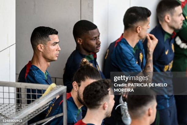 Portugals forward Cristiano Ronaldo attends with his teammates a training session at Cidade do Futebol training camp in Oeiras, outskirts of Lisbon,...