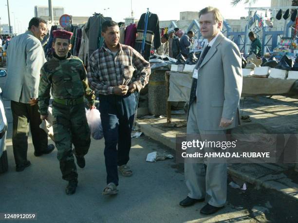 World Food Program Chief of Iraq Dane Torben Due visits 16 January 2003 the al-Alawi souk in Baghdad. AFP PHOTO/Ahmad Al-RUBAYE