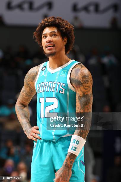 Kelly Oubre Jr. #12 of the Charlotte Hornets looks on during the game against the Indiana Pacers on March 20, 2023 at Spectrum Center in Charlotte,...