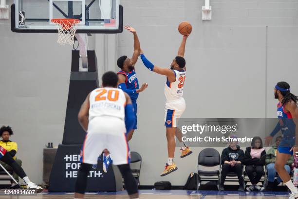 Walker of the Westchester Knicks goes to the basket against David Nwaba of the Motor City Cruise on March 20, 2023 at Wayne State Fieldhouse in...