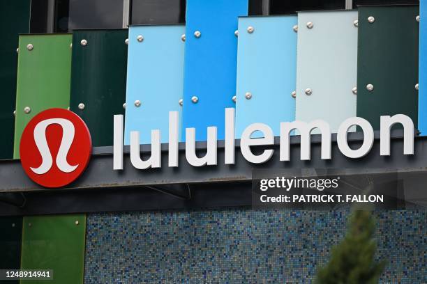 Signage is displayed outside of a Lululemon Athletica Inc store in Santa Monica, California on March 20, 2023.