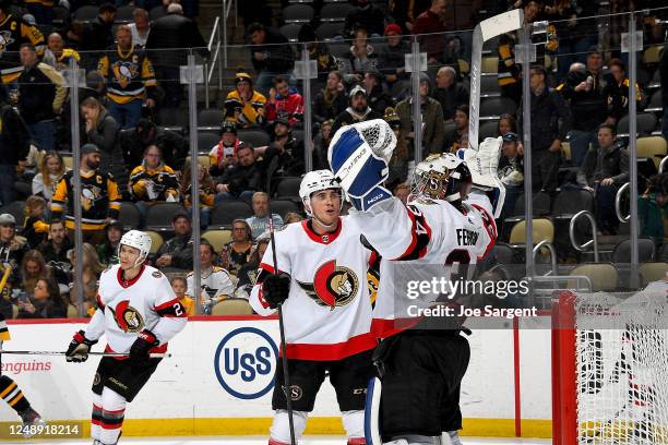 Dylan Ferguson of the Ottawa Senators celebrates after defeating the Pittsburgh Penguins 2-1 at PPG PAINTS Arena on March 20, 2023 in Pittsburgh,...