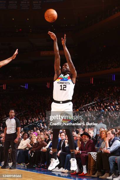 Taurean Prince of the Minnesota Timberwolves shoots a three point basket during the game against the New York Knicks on March 20, 2023 at Madison...