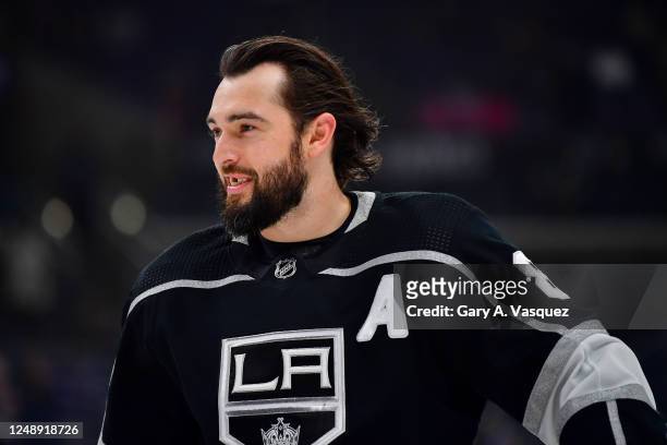 Drew Doughty of the Los Angeles Kings smiles during warm ups prior to the game against the Calgary Flames at Crypto.com Arena on March 20, 2023 in...