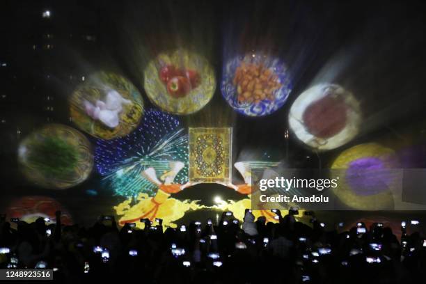 Light show performance carried out as part of the Nowruz spring festival celebrations at "Iran Mall" shopping center in Tehran, Iran on March 21,...