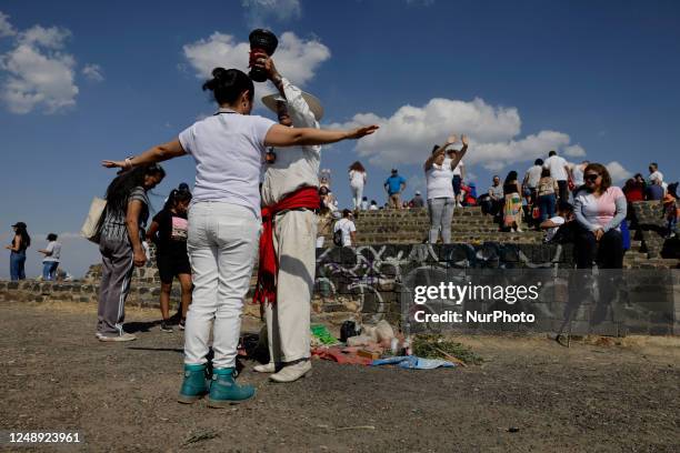 Person performs a pre-Hispanic ritual for inhabitants of Mexico City who visited the Cerro de la Estrella archaeological site in the Iztapalapa...