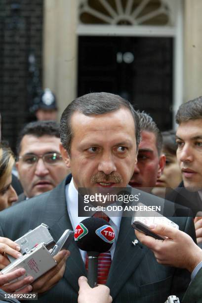 The leader of Turkey's Islamist-based Justice and Development Party , Recep Tayyip Erdogan, gives a press conference 20 November 2002 outside No. 10...