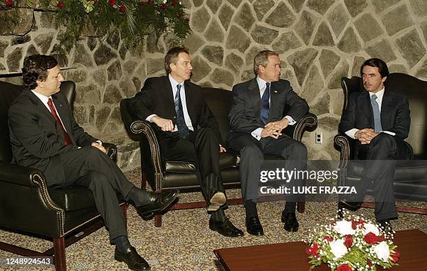 President George W. Bush , meets 16 March with British Prime Minister Tony Blair , Spanish Prime Minister Jose Maria Aznar , and Portuguese Prime...