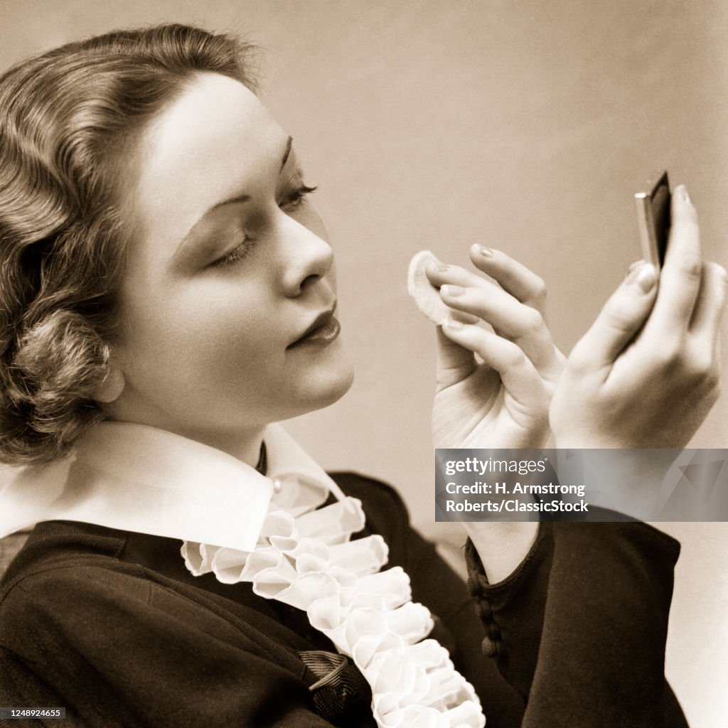 Woman Powdering Her Nose