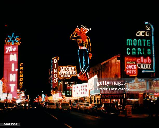 1950s Colorful Neon Signs Light Downtown Nightlife Along Fremont Street Las Vegas Nevada USA