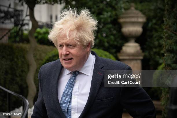Former British prime minister Boris Johnson leaves his home on March 21, 2023 in London, England. The former prime minister will attend a televised...