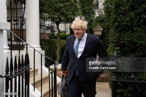 Former British prime minister Boris Johnson leaves his home on March 21, 2023 in London, England. The former prime minister will attend a televised...