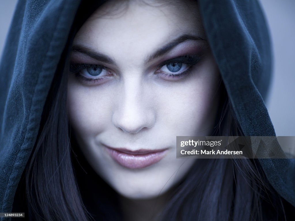 USA, Utah, Cedar Hills, Portrait of female teenage vampire (16-17) wearing hood