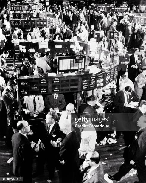 Anonymous Men Businessmen Brokers Traders Active On Floor Of New York Stock Exchange New York City Ny USA