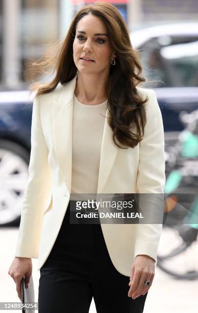 Britain's Catherine, Princess of Wales, arrives at NatWest's headquarters in the City of London on March 21, 2023 to host the inaugural meeting of...