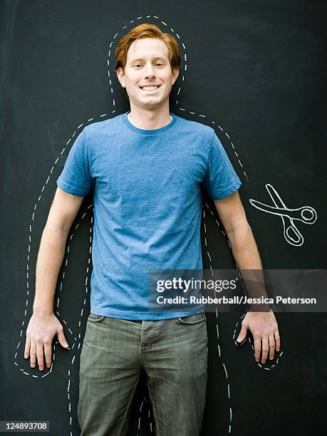 studio shot of man with chalk outline - cardboard cut out stock pictures, royalty-free photos & images