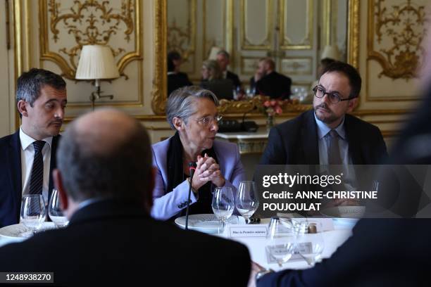 French Prime Minister Elisabeth Borne chairs a working lunch with members of her cabinet at Matignon Hotel, in Paris, on March 21, 2023. - The French...