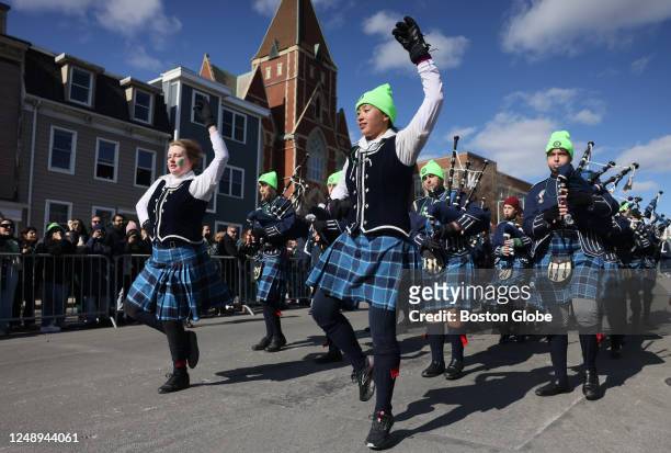 Boston, MA Members of the Berkeley Preparatory School Pipe and Drum Corps perform at the 2023 St. Patrick's Day Parade.