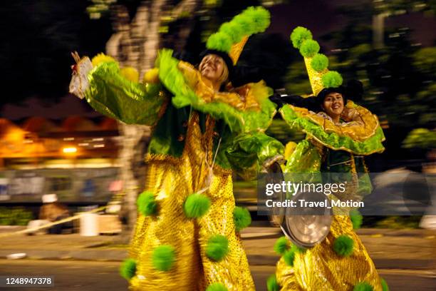 people with carnival costumes at sambadrome parade in rio de janeiro - carnaval rio de janeiro stock pictures, royalty-free photos & images