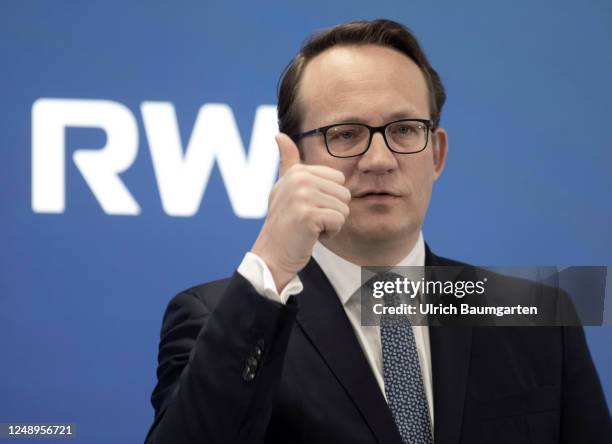 Markus Krebber, CEO of Germany energy giant RWE, presents his company's annual results during a press conference at RWE's headquarters on March 21,...