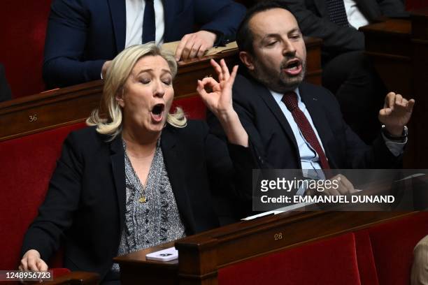 Rassemblement National MP Marine Le Pen gestures during a session of Questions to the government at the French National Assembly in Paris, on March...