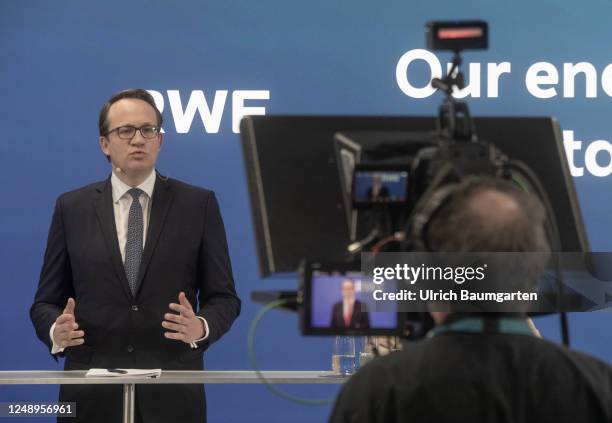 Markus Krebber, CEO of Germany energy giant RWE, presents his company's annual results during a press conference at RWE's headquarters on March 21,...