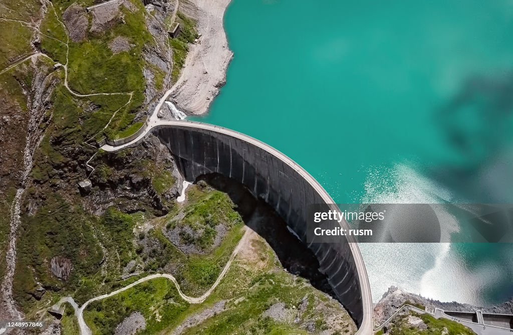 Overhead aerial view of Stausee Mooserboden Dam, Kaprun, Austria